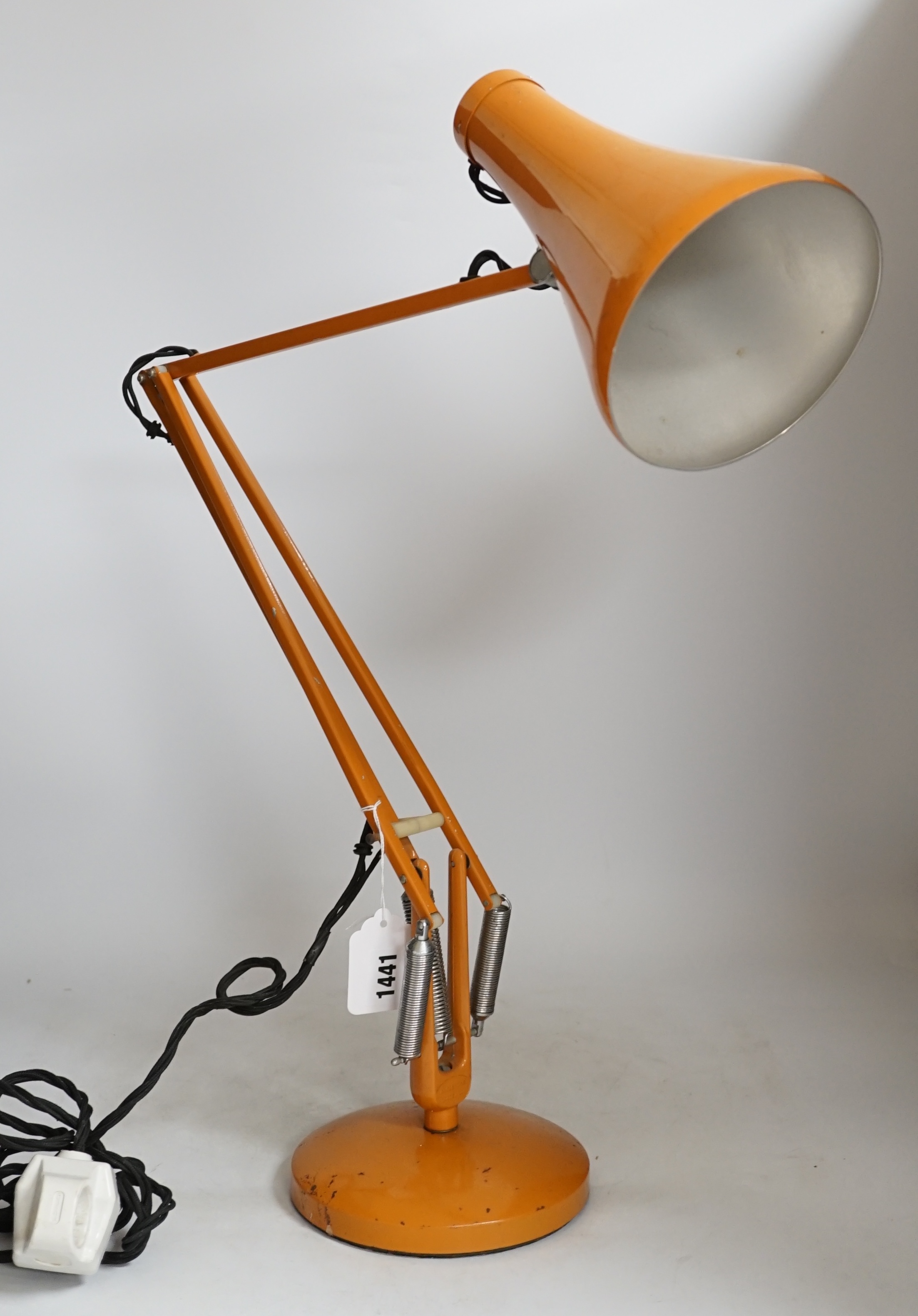 A Herbert Terry orange anglepoise lamp, highest height 89cm